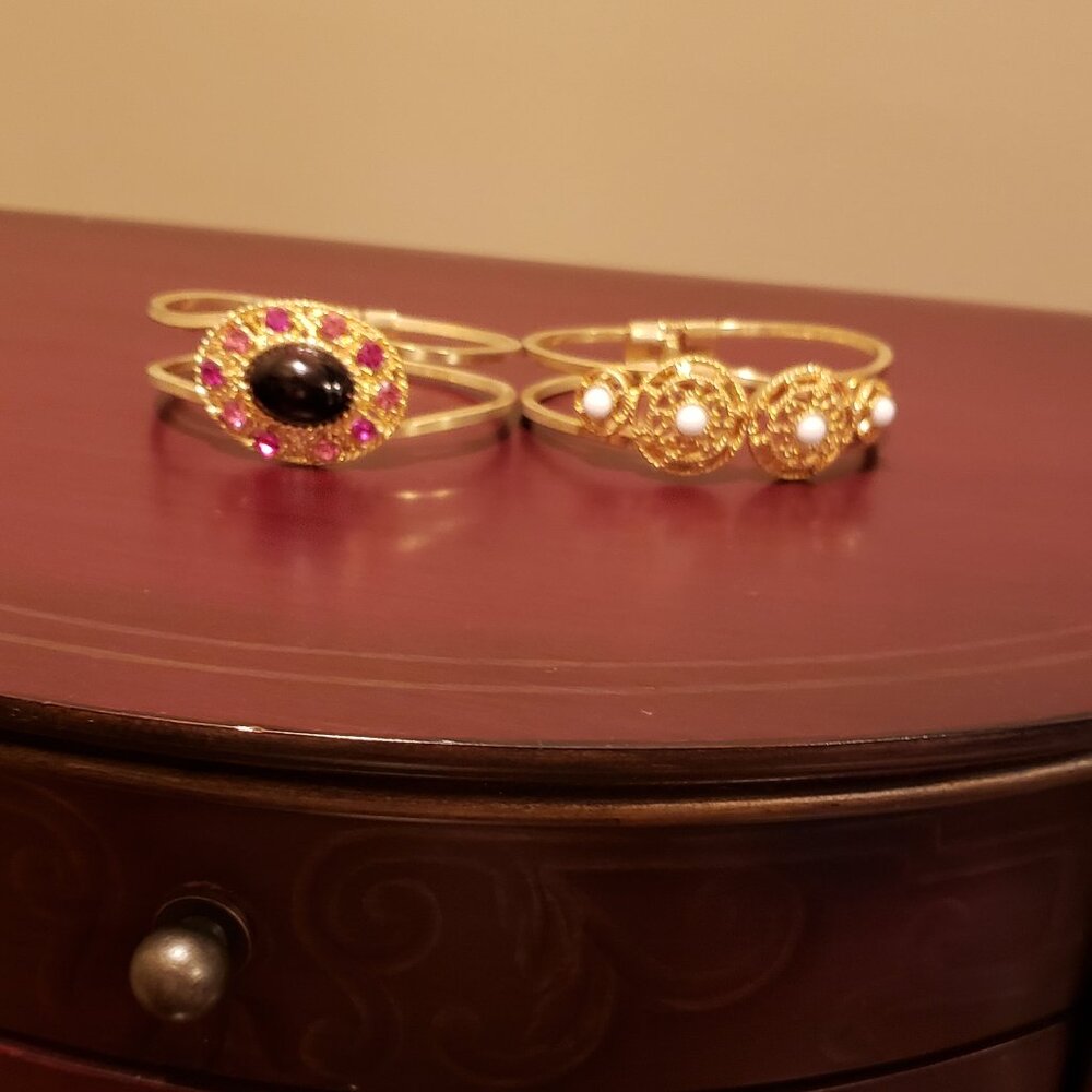 2 Bebe bangles gold white